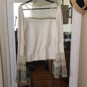 Bell sleeves dramatic top